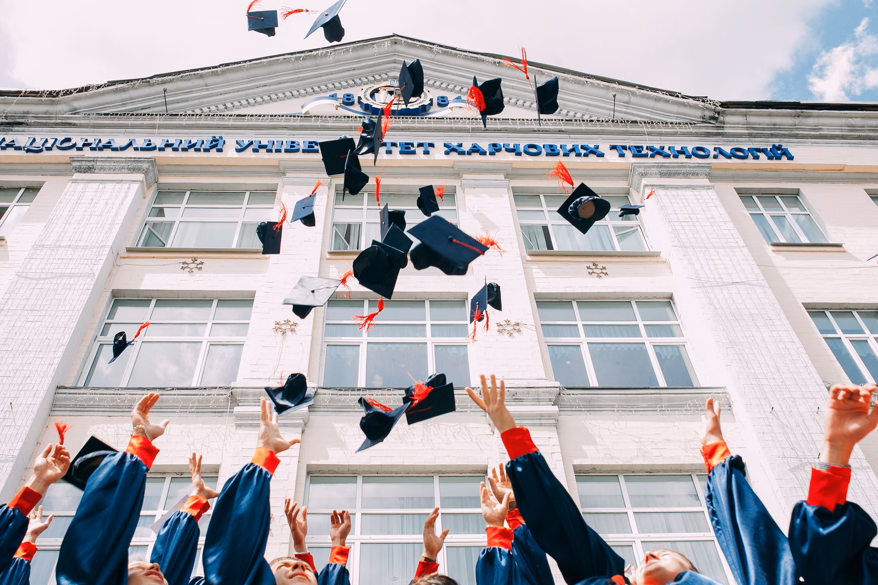 caps being thrown in the air 