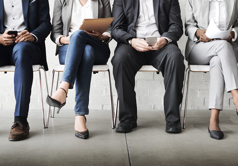 people sat waiting for an interview 